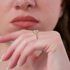 The Penelope Set Hidden Halo  With A 5 Carat Oval 14K Yellow Gold Moissanite