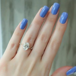 The Penelope Set Hidden Halo  With A 4 Carat Oval 14K Yellow Gold Moissanite
