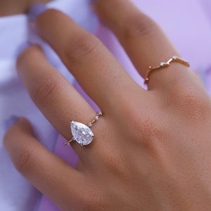 The Penelope Set Hidden Halo  With A 4.5 Carat Pear 14K Rose Gold Moissanite