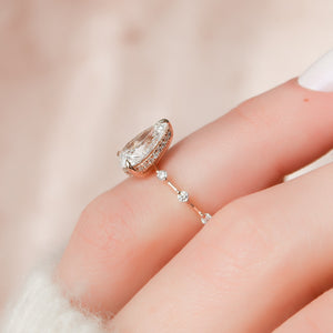 The Penelope Set Hidden Halo  With A 3 Carat Pear 14K Rose Gold Moissanite
