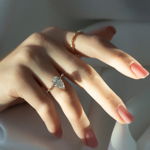 The Penelope Set Hidden Halo  With A 2.5 Carat Pear 14K Rose Gold Moissanite
