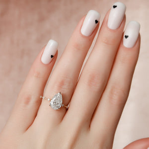 The Penelope Set Hidden Halo  With A 4.5 Carat Pear 14K Rose Gold Moissanite