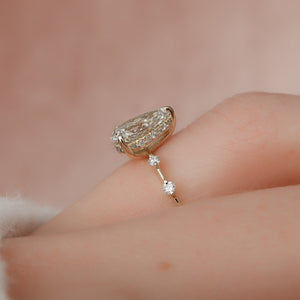 The Penelope Set Hidden Halo  With A 3.5 Carat Pear 18K Yellow Gold Moissanite