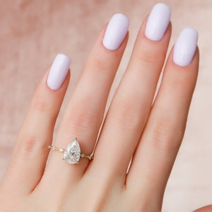 The Penelope Set Hidden Halo  With A 2.5 Carat Pear 18K Yellow Gold Moissanite