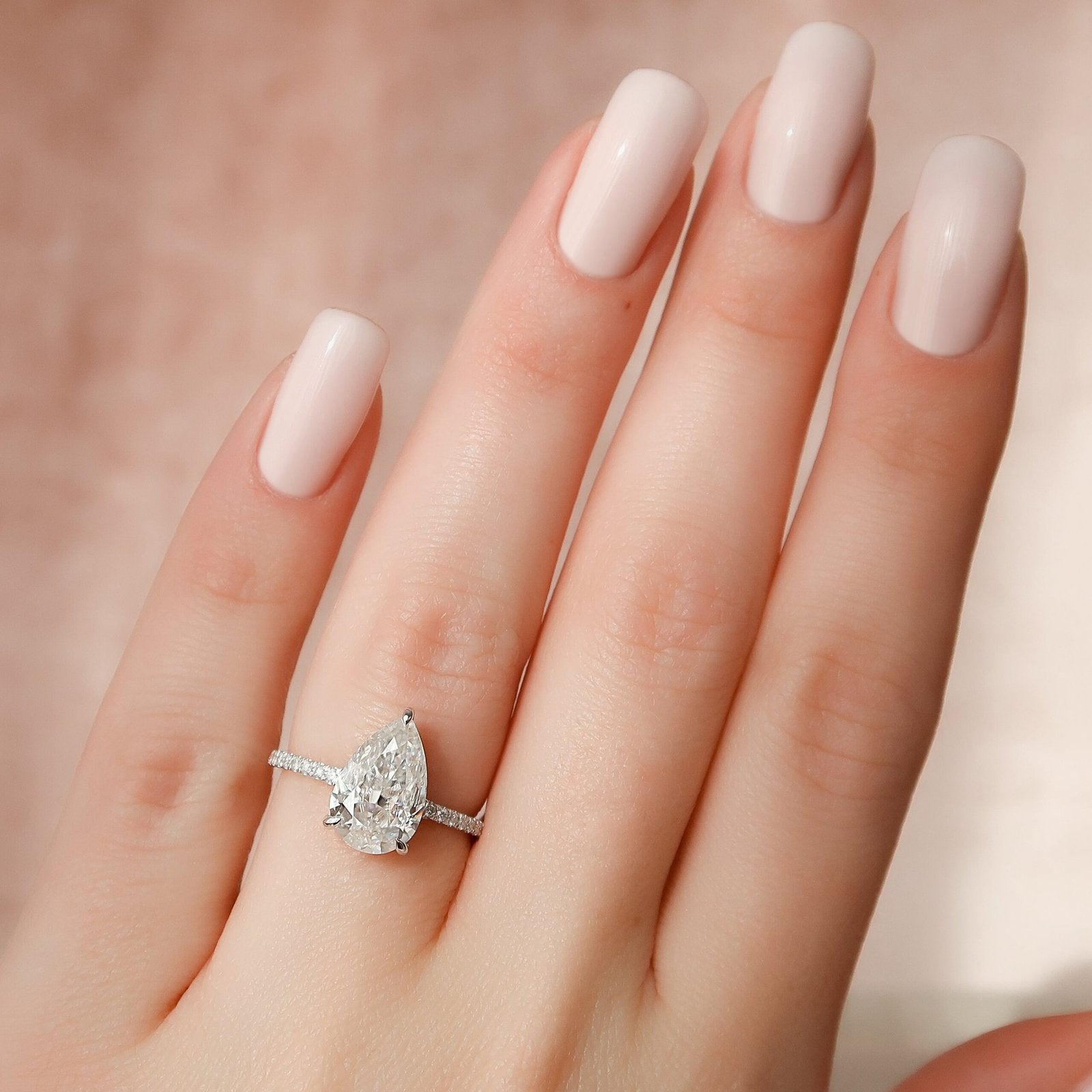 The Mandy Set  With A 4 Carat Pear 14K White Gold Moissanite