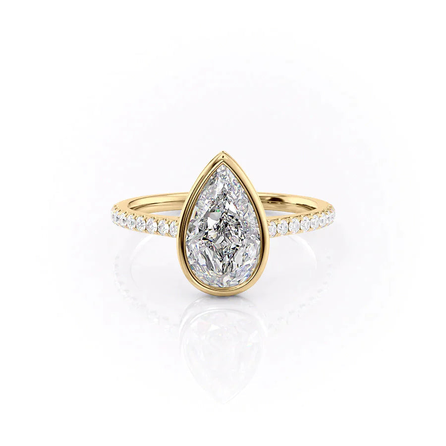 The Pave Charlotte Set With A 1 Carat Pear 18K Yellow Gold Lab Diamond