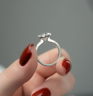 The Rebecca Set  With A 3 Carat Oval 14K White Gold Moissanite