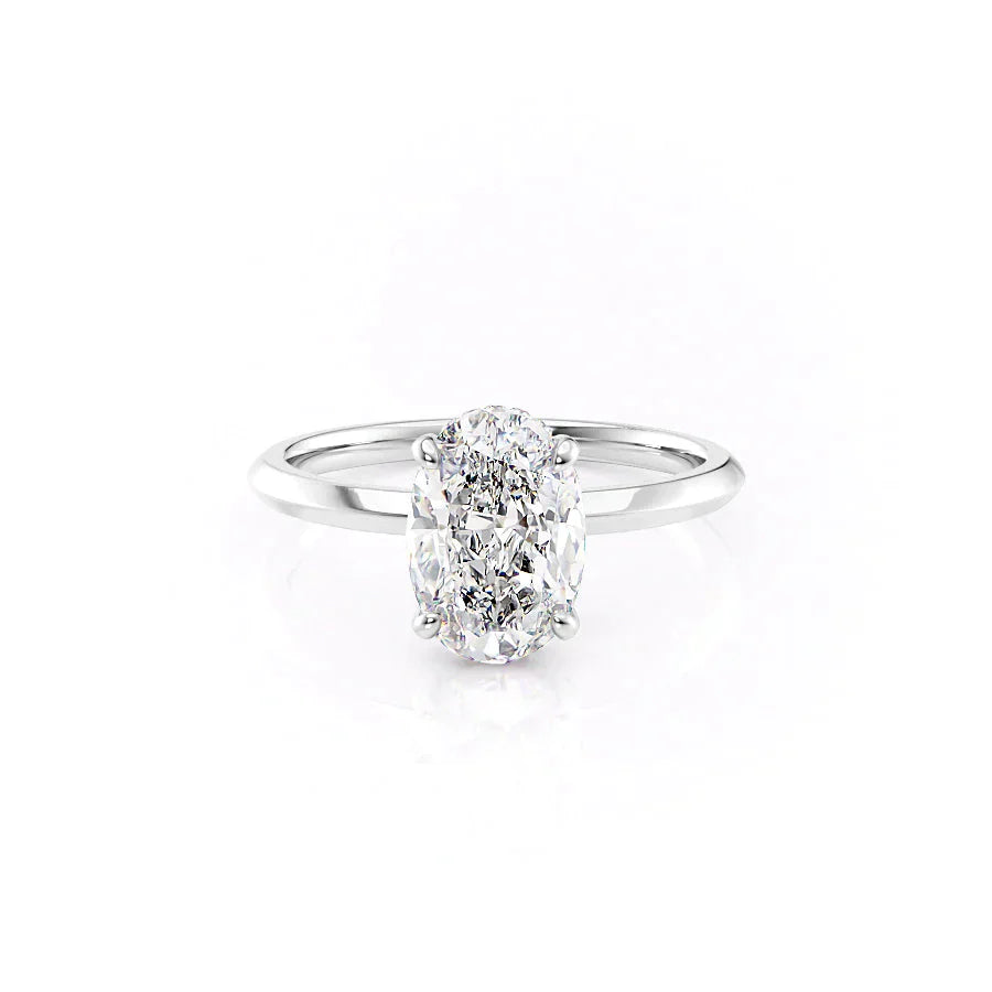 The Razor Kamellie Set  With A 2.5 Carat Oval 14K White Gold Moissanite