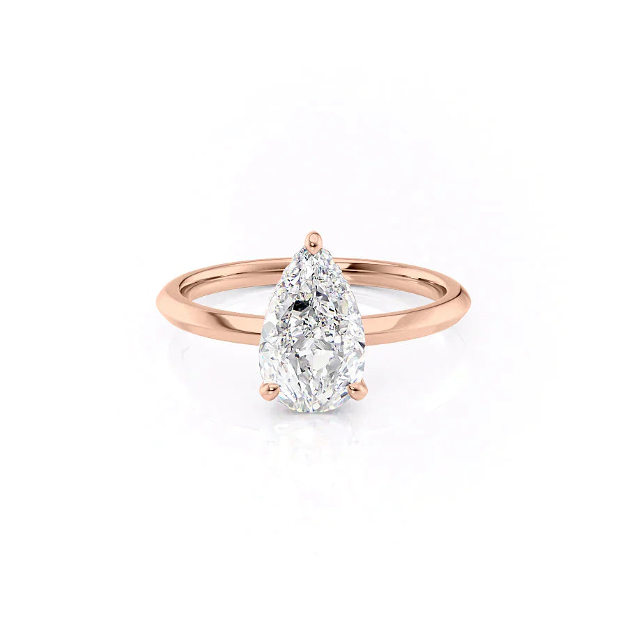 The Razor Kamellie Set  With A 1.5 Carat Pear 14K Rose Gold Moissanite