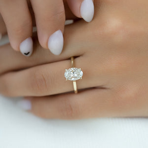 The Natalie Set  With A 2.5 Carat Oval 18K Yellow Gold Moissanite