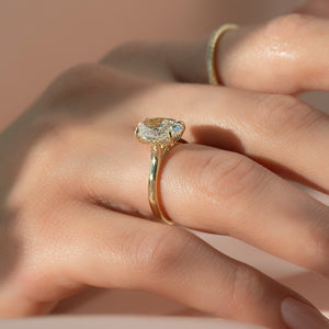 The Natalie Set  With A 2.5 Carat Oval 18K Yellow Gold Moissanite