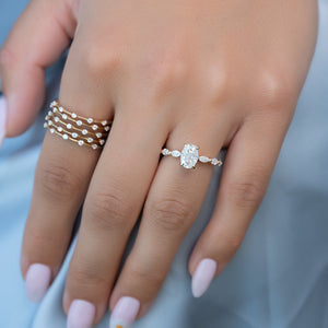 The Lucia Set Marquise  With A 3 Carat Oval 18K Yellow Gold Moissanite