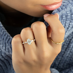 The Lucia Set Marquise  With A 3 Carat Oval 18K Yellow Gold Moissanite