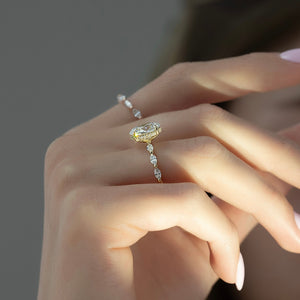 The Lucia Set Marquise  With A 3 Carat Oval 18K Yellow Gold Moissanite