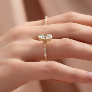 The Lucia Set Marquise  With A 3 Carat Oval 18K Yellow Gold Moissanite
