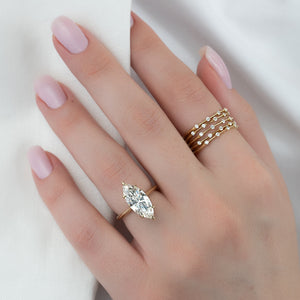 The Claire Set  With A 3 Carat Marquise 18K Yellow Gold Moissanite