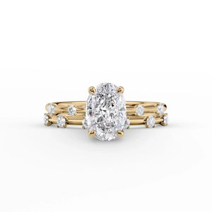 The Serena Set  With A 2.5 Carat Oval 18K Yellow Gold Moissanite