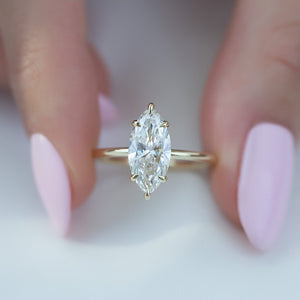 The Low Profile Kamellie Set  With A 3 Carat Marquise 14K Yellow Gold Solitaire Moissanite