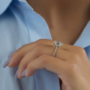 The Pave Claire Set  With A 4 Carat Oval 18K White Gold Moissanite