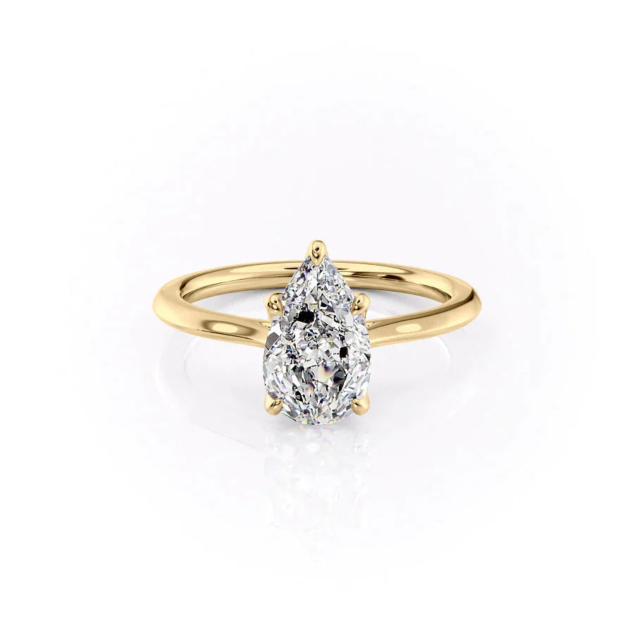 The Solitaire Madison Set  With A 4 Carat Pear 14K Yellow Gold Moissanite