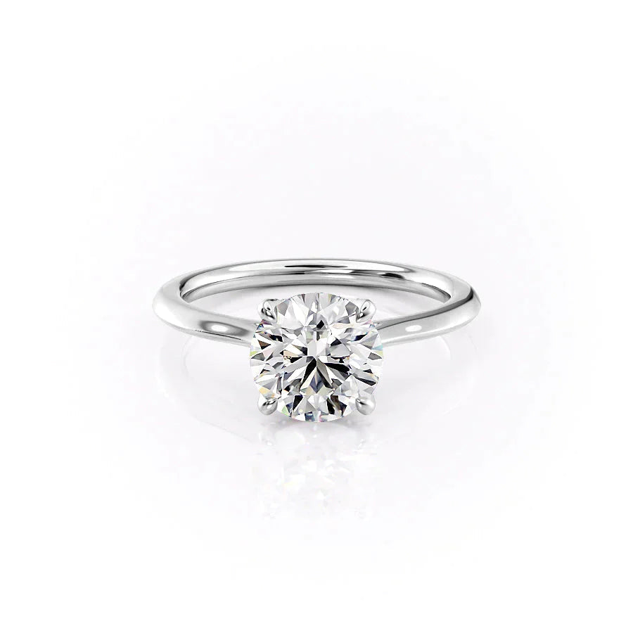 The Solitaire Madison Set  With A 1.5 Carat Round 18K White Gold Moissanite