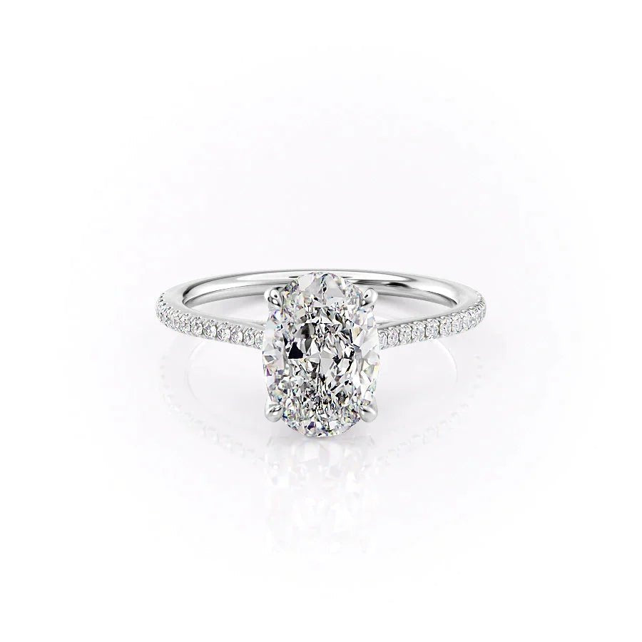 The Pave Madison Set  With A 1.5 Carat Oval 18K White Gold Moissanite