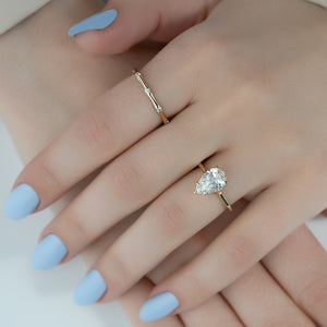 The Lexie Set  With A 2.5 Carat Pear 14K Yellow Gold Moissanite