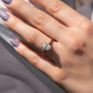 The Lexie Set  With A 2.5 Carat Pear 14K Yellow Gold Moissanite
