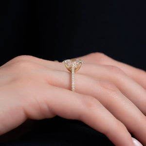 The Pave Lexie Set  With A 5 Carat Oval 18K Yellow Gold Moissanite