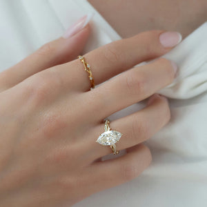 The Pave Twig Set  With A 5 Carat Marquise 18K Yellow Gold Moissanite
