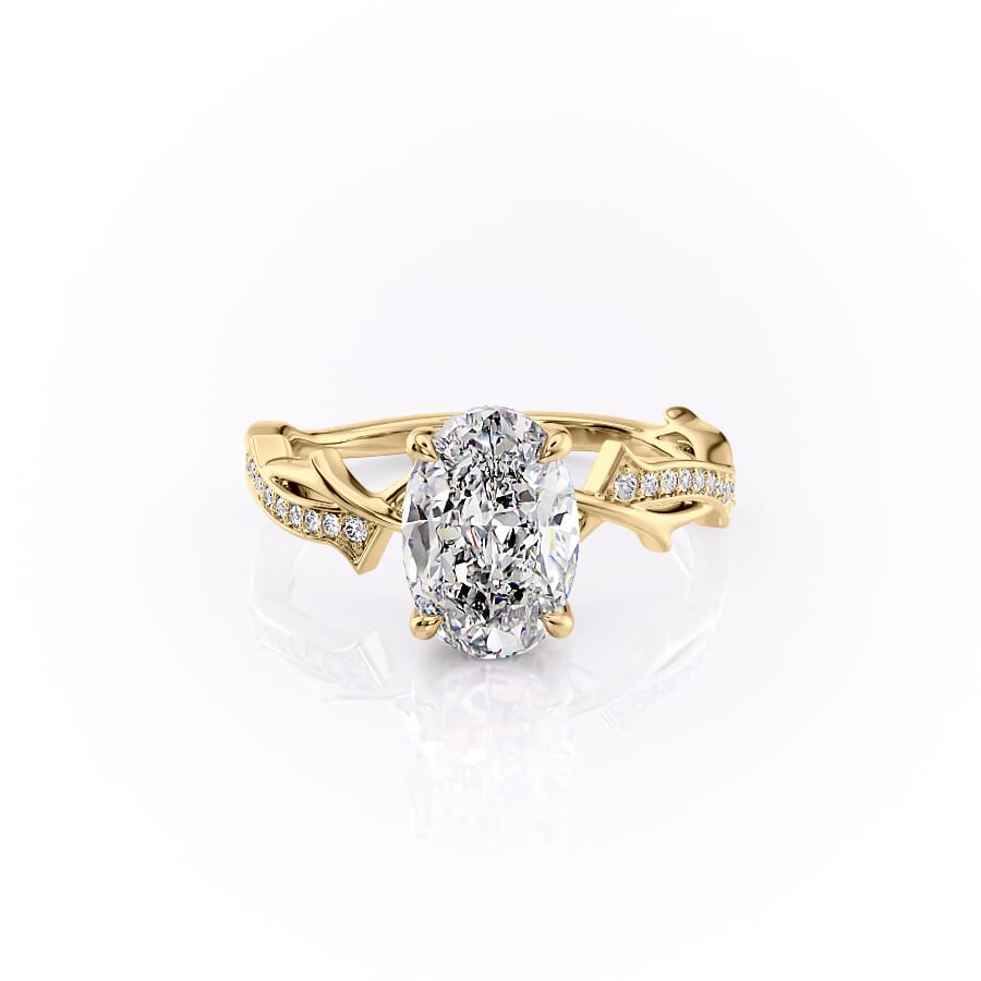 The Pave Twig Set  With A 2.5 Carat Oval 18K Yellow Gold Moissanite