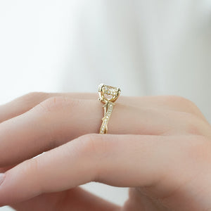 The Pave Twig Set  With A 4 Carat Oval 14K Yellow Gold Moissanite