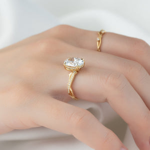 The Pave Twig Set  With A 2.5 Carat Oval 14K Yellow Gold Moissanite