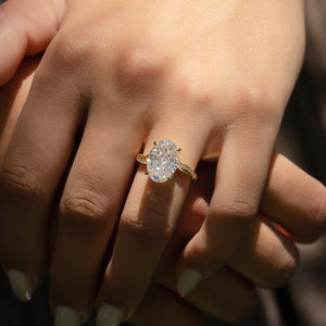 The Pave Twig Set  With A 1 Carat Oval 18K Yellow Gold Moissanite