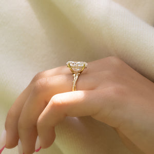 The Pave Twig Set  With A 2 Carat Oval 14K Yellow Gold Moissanite