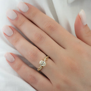 The Pave Twig Set  With A 2 Carat Oval 14K Yellow Gold Moissanite