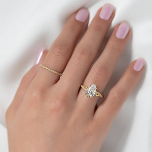 The Pave Twig Set  With A 2 Carat Pear 14K Yellow Gold Moissanite
