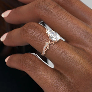 The Pave Twig Set  With A 4 Carat Pear 18K Rose Gold Moissanite