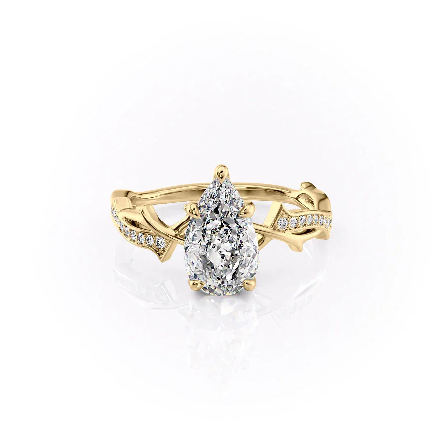 The Pave Twig Set  With A 1.5 Carat Pear 18K Yellow Gold Moissanite