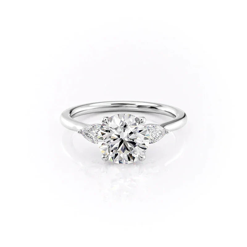 The Baguettes Megan Set  With A 4 Carat Pear 14K White Gold Moissanite