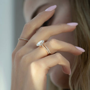 The Pave Ashley Set  With A 3 Carat Oval 14K Rose Gold Moissanite