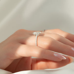 The Pave Ashley Set  With A 1.5 Carat Oval 18K White Gold Moissanite
