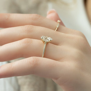 The Pave Ashley Set  With A 1.5 Carat Oval 18K Yellow Gold Moissanite