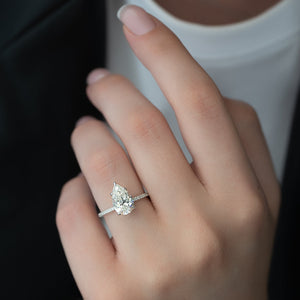 The Pave Ashley Set  With A 3 Carat Pear 18K White Gold Moissanite