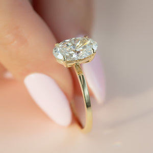 The Eleanor Set  With A 2.5 Carat Oval 18K Yellow Gold Moissanite