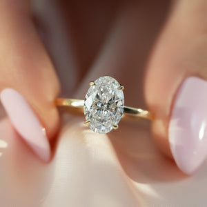The Eleanor Set  With A 2.5 Carat Oval 18K Yellow Gold Moissanite