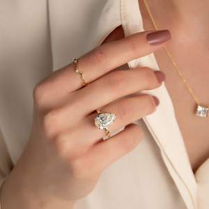 The Eleanor Set  With A 2.5 Carat Pear 14K Yellow Gold Moissanite
