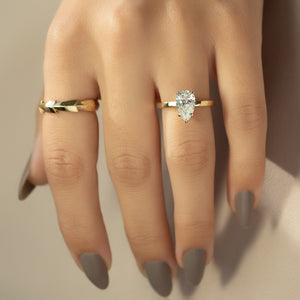 The Eleanor Set  With A 2.5 Carat Pear 14K Yellow Gold Moissanite