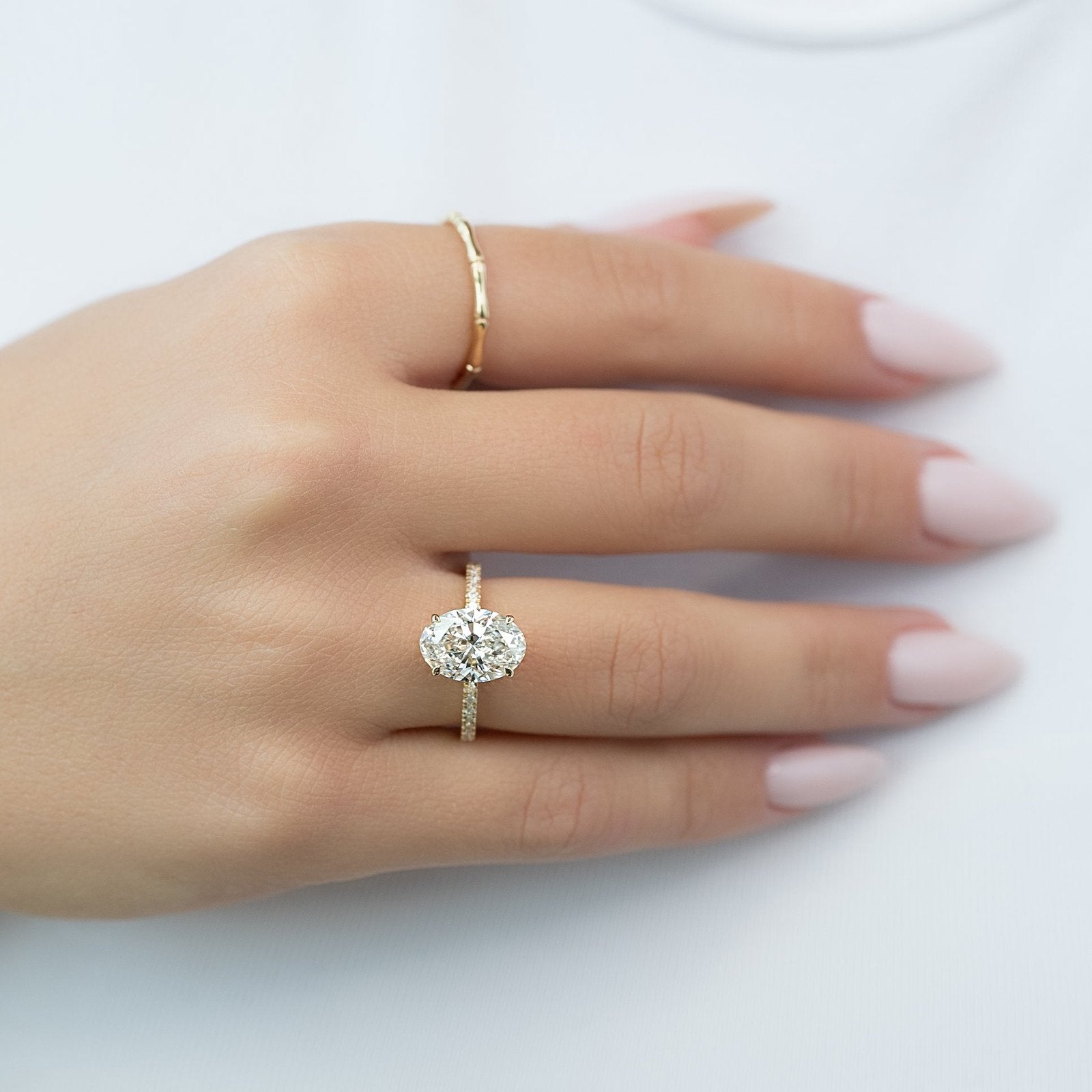 The Pave Eleanor Set With A 1 Carat Oval 14K Yellow Gold Lab Diamond