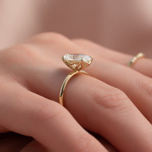 The Alison Set  With A 2.5 Carat Oval 18K Yellow Gold Moissanite